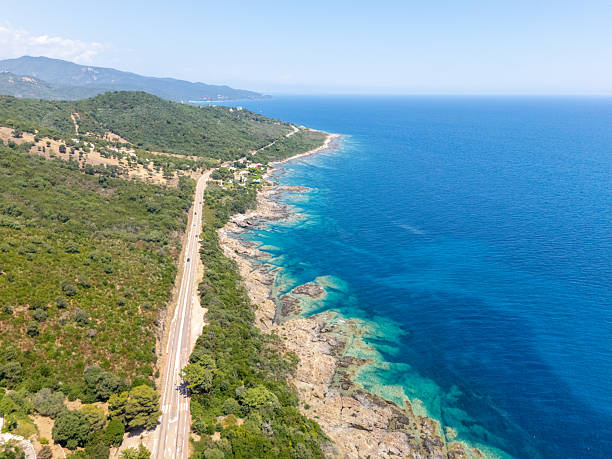 istock Coastal Road Along Rocky Mediterranean Shoreline 2226621193