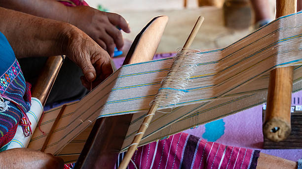 istock Hand weaving loom with thread in rural home workshop, Mae Hong Son, Thailand 2226624465