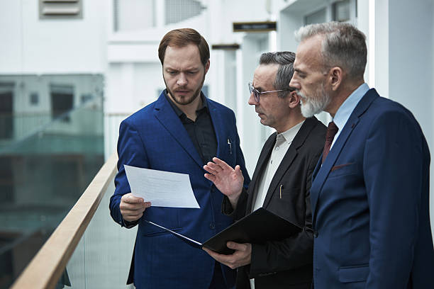 istock Discussing Business Strategies in Modern Office Setting 2226626165