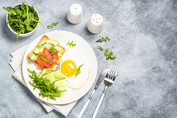 istock Healthy breakfast with egg, toast and salad. 2226627267