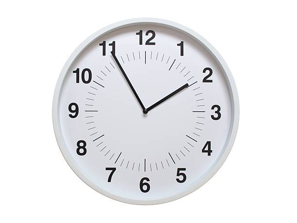 istock Simple white analog wall clock showing exactly 01:55 or 13:55. suitable for concepts like deadline, start or end of time. Isolated on a clean white background. 2226627291
