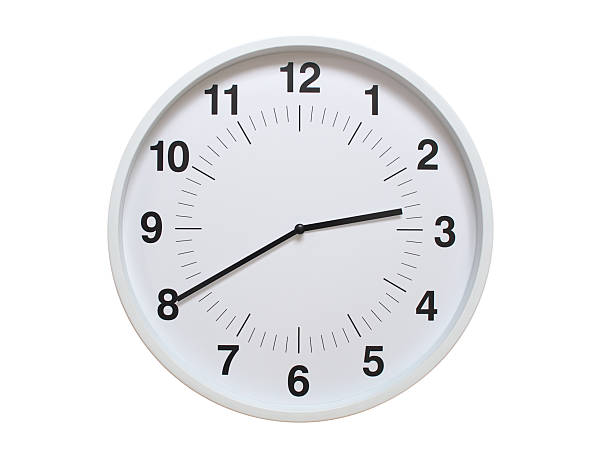 Simple white analog wall clock showing exactly 02:40 or 14:40. suitable for concepts like deadline, start or end of time. Isolated on a clean white background.