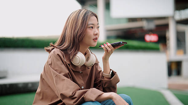 istock Young Gen Z female interacting with a voice assistant 2226636507