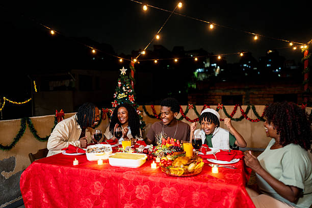 istock Family talking during christmas dining on house rooftop 2226641507