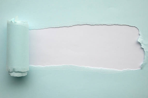 istock Blue torn paper rolled edge with space isolated on white background 2226643777