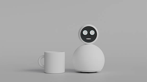 istock Model of round white home assistant robot with face screen and white cup standing next to it on light gray background, robotics for home use 2226644091