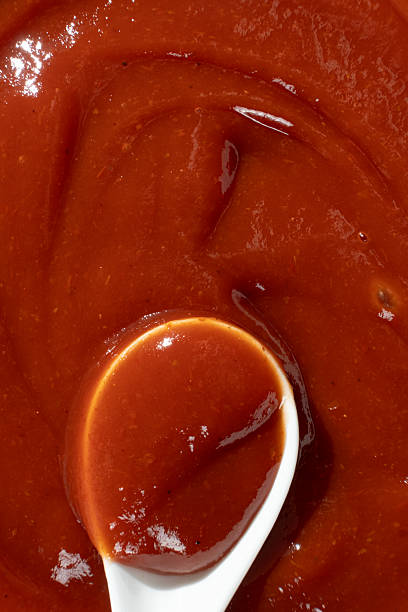 istock Traditional Ketchup in Spoon Macro. Organic Culinary Element. 2226645009