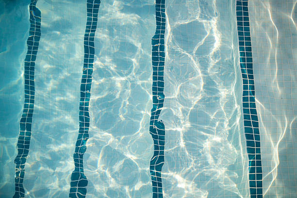 Outdoor pool with clear, blue water.