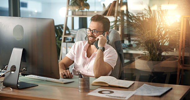 istock Phone call, computer and businessman in office talking for virtual meeting, online discussion and communication. Client, web designer and person on smartphone for conversation, chat and networking 2226650837