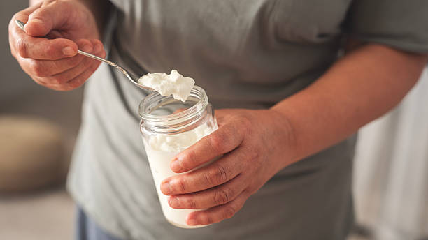 istock Yogurt eating concept, natural healthy probiotic 2226651717