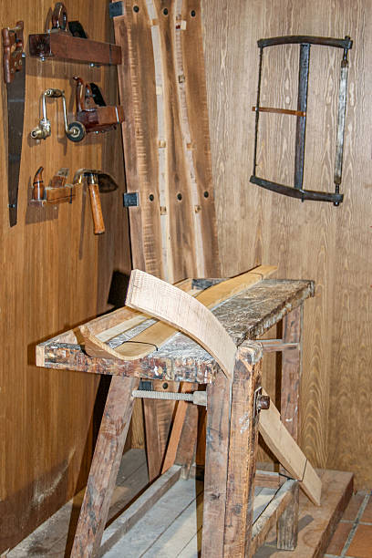 istock Historical ski workshop with traditional tools and wooden ski parts. 2226652001