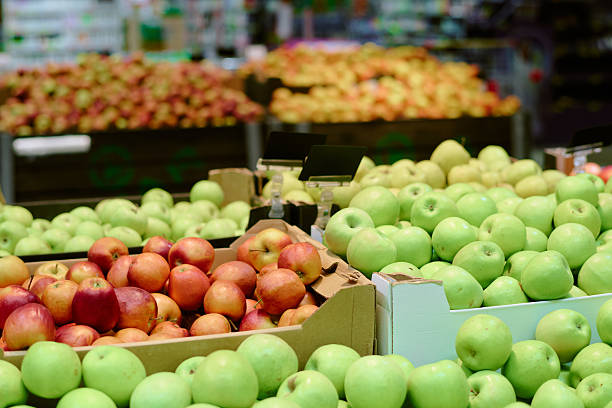 istock Displaying Fresh Apples in Grocery Market Aisle 2226656588