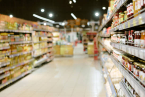 istock Shopping in Brightly Lit Supermarket Aisle 2226656597