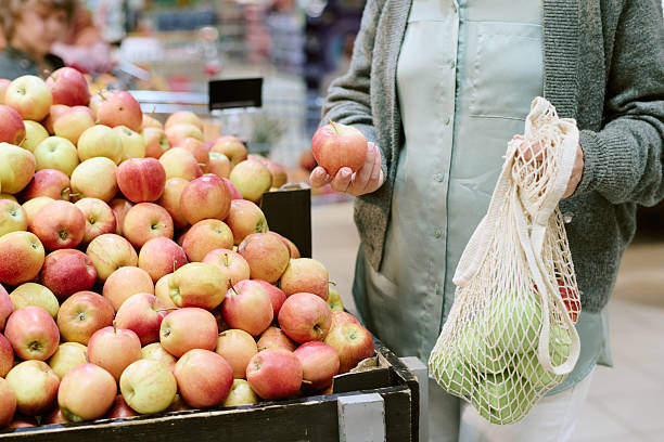 istock Shopping for Fresh Apples at Local Market 2226656778