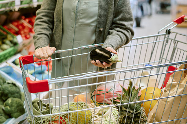 istock Shopping for Fresh Produce in Grocery Store 2226656879