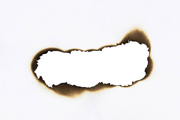 istock Torn and burnt paper edge creating a long grunge banner or frame. Vintage design element for title or header. isolated on white background with clipping path. 2226661092