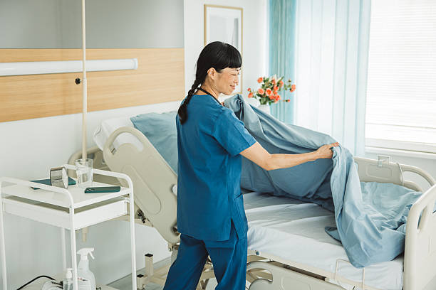 istock Nurse cleaning hospital ward 2226664349