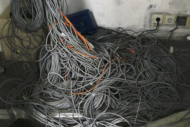 istock Photo of internet cables that look messy inside the server 2226664402