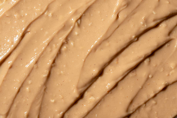istock Macro close-up of creamy peanut butter texture 2226664731
