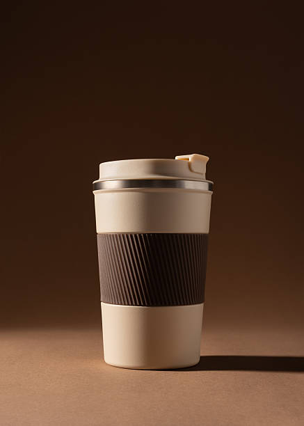 istock Reusable coffee  thermo cup, mockup on warm beige background 2226666297