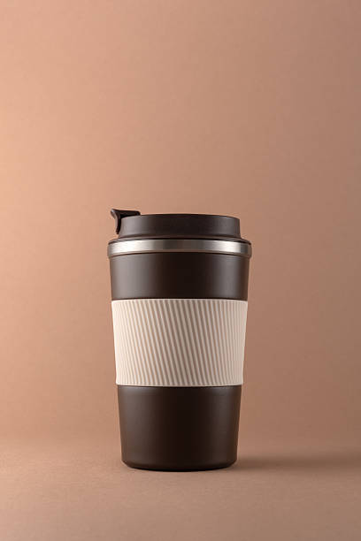 istock Reusable coffee  thermo cup, mockup on warm beige background 2226666329