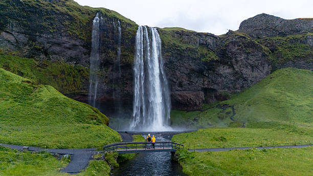 istock Majestic Seljalandsfoss waterfall with visitors exploring breathtaking Icelandic nature 2226676534