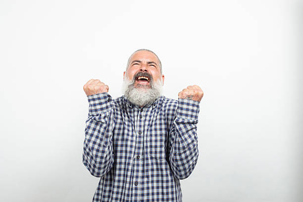 istock Euphoric senior man celebrating with enthusiasm and joy 2226677840