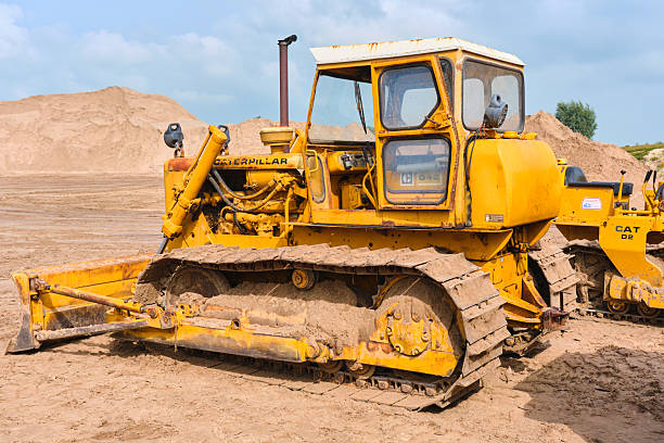 Detail of a tracked vehicle on a clay construction site