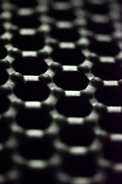 istock Hexagonal honeycomb rubber mat texture, black anti-tracking litter mat close-upHexagonal honeycomb rubber mat texture, black anti-tracking litter mat close-up 2226683002