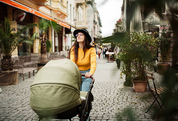 istock Mother and her child taking a walk around the town. 2226684906