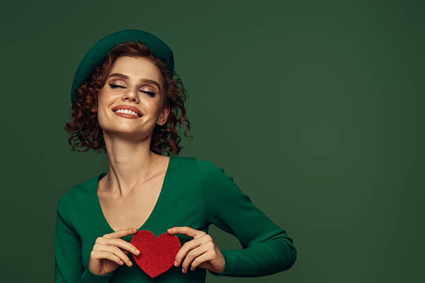 istock Holding Love Close: A Radiant Smile with a Heartfelt Touch 2226688408