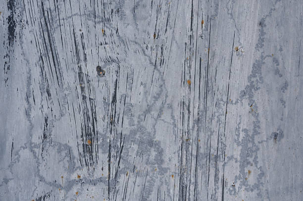 Metal texture with scratches and cracks which can be used as a background