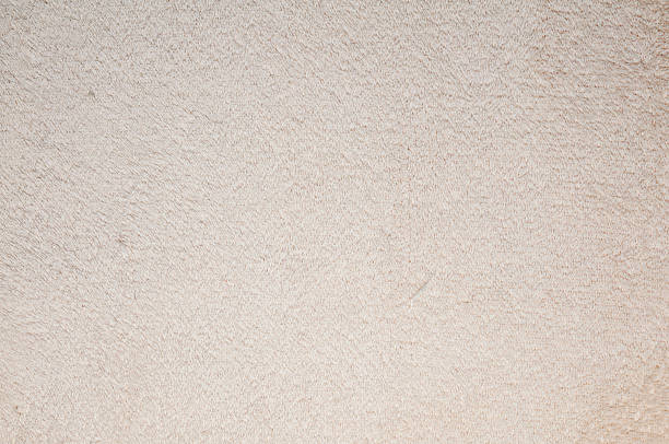 istock This image displays a close-up view of a soft and fluffy white towel. 2226690084