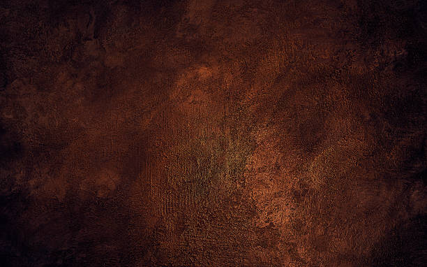 istock dark bronze plastered wall covered with decorative stucco 2226692070