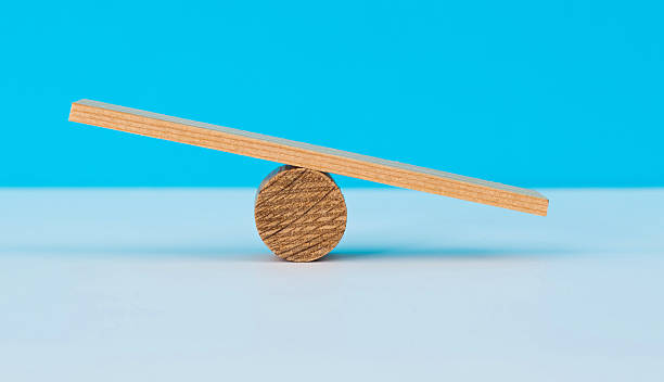 istock A seesaw made of building blocks 2226692248