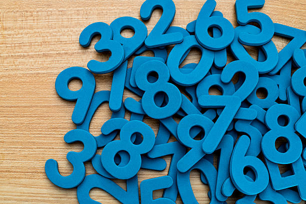 Heap of foam numbers on the table.