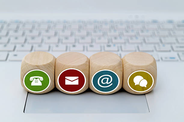 Contact us icons on laptop keyboard.