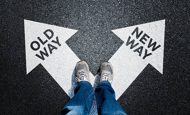 istock Low section view of man standing by text OLD WAY or NEW WAY 2226692719