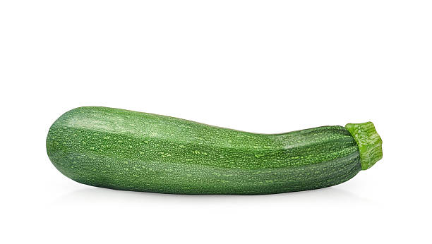 green zucchini isolated on a white background