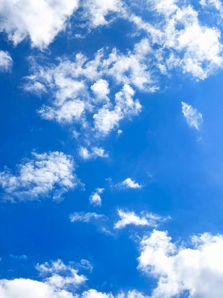 istock Bright blue sky with fluffy white clouds creating a serene and tranquil atmosphere 2226695755