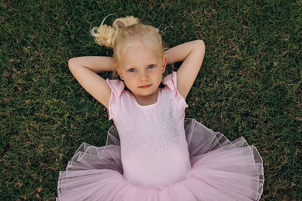 istock Little Ballerina Resting on Grass 2226699059