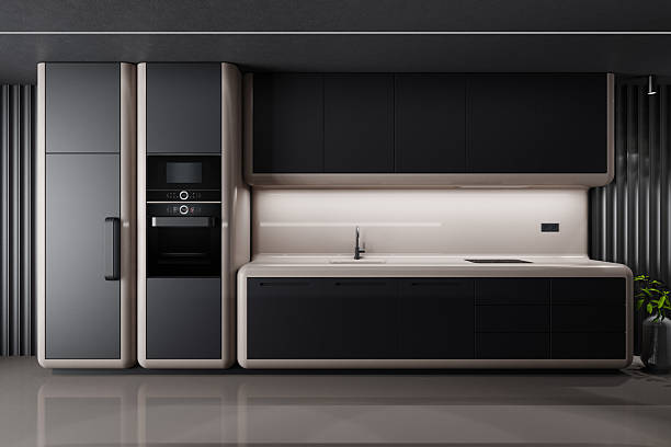 Stylish futuristic kitchen featuring a round central island with a high-gloss finish and three minimalist chairs, embodying modern elegance and functionality. The space is defined by smooth, curved cabinetry in matte beige and black tones, creating a striking contrast. Contemporary ceiling lights and a large window with horizontal blinds provide ambient and natural lighting. A small indoor plant subtly softens the monochromatic palette, while the rounded edges and fluid geometry showcase cutting-edge design. Ideal for showcasing modern kitchen layouts, home renovation ideas, luxury interiors, futuristic furniture concepts, curved-line architecture, or premium appliance branding.