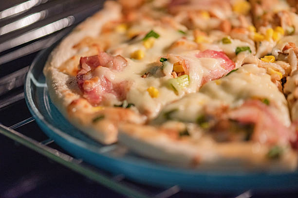 istock Pizza in a ceramic plate for serving. Pizza with chicken and bacon. 2226705615