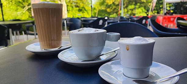 istock three different types of coffee, espresso, cappuccino, and latte served outdoors at a ?afe in Portugal. Concept of the countrys coffee culture and beverage themes. 2226708161