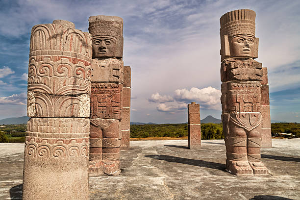 Toltec warrior statues aligned on platform at Tula archaeological site in Mexico