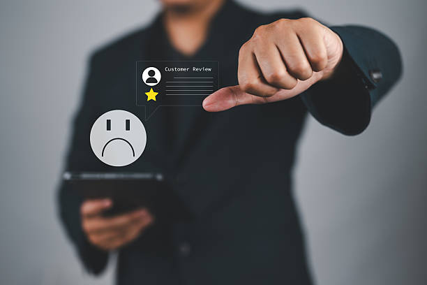 istock Customer Experience dissatisfied Concept, Unhappy Businessman with Sadness Emotion Face on virtual screen, Bad review, bad service dislike bad quality, low rating, social media not good. 2226715169