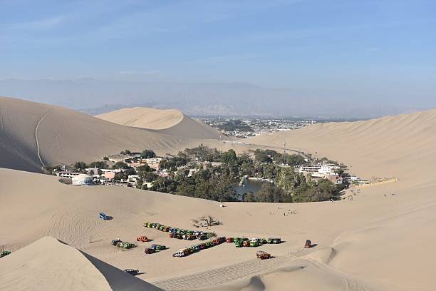 istock Peru's Desert Gem: Huacachina Oasis with Sand Dune Vehicles 2226717302