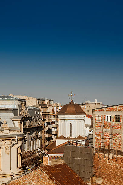 istock Architectural Rooftops and Blue Sky View Over Historical City 2226719298