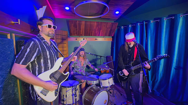 istock Middle aged men playing together in a band 2226728230