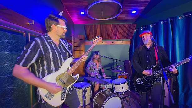 istock Middle aged men playing together in a band 2226728240
